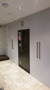 Custom built Modern and flush cupboards and access to cellar
